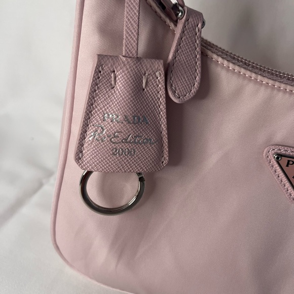 The Re-Nylon Re-Edition 2000 mini bag( has a little stain on the corner  )pic #3 - Picture 7 of 9